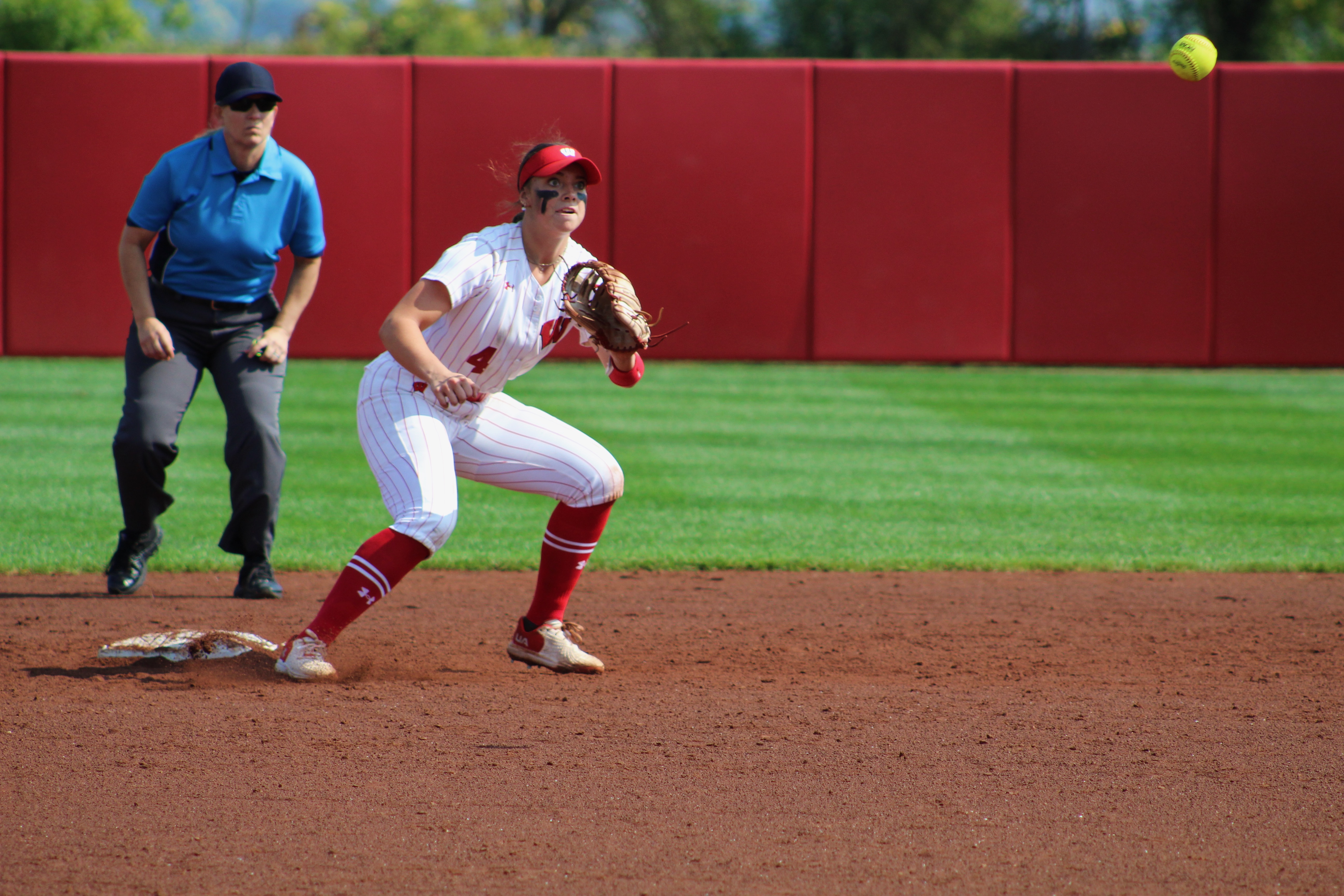 Ava Kuszack prepares to catch a ball and tag out a runner at 2nd base (9.23.23).