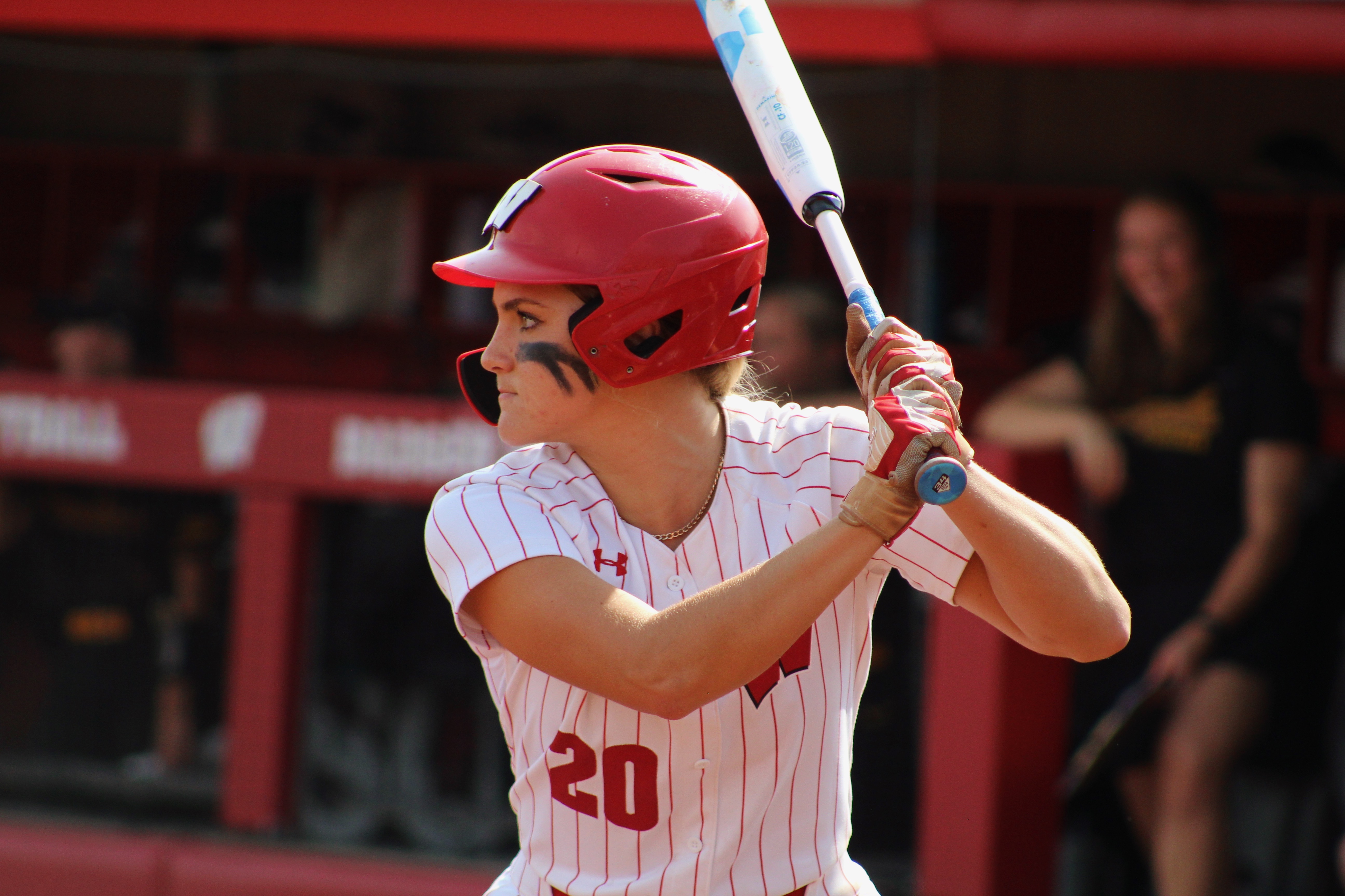 Molly Schlosser stares down a pitch during Wisconsin's fall matchup against Loyola Chicago (9.23.23).