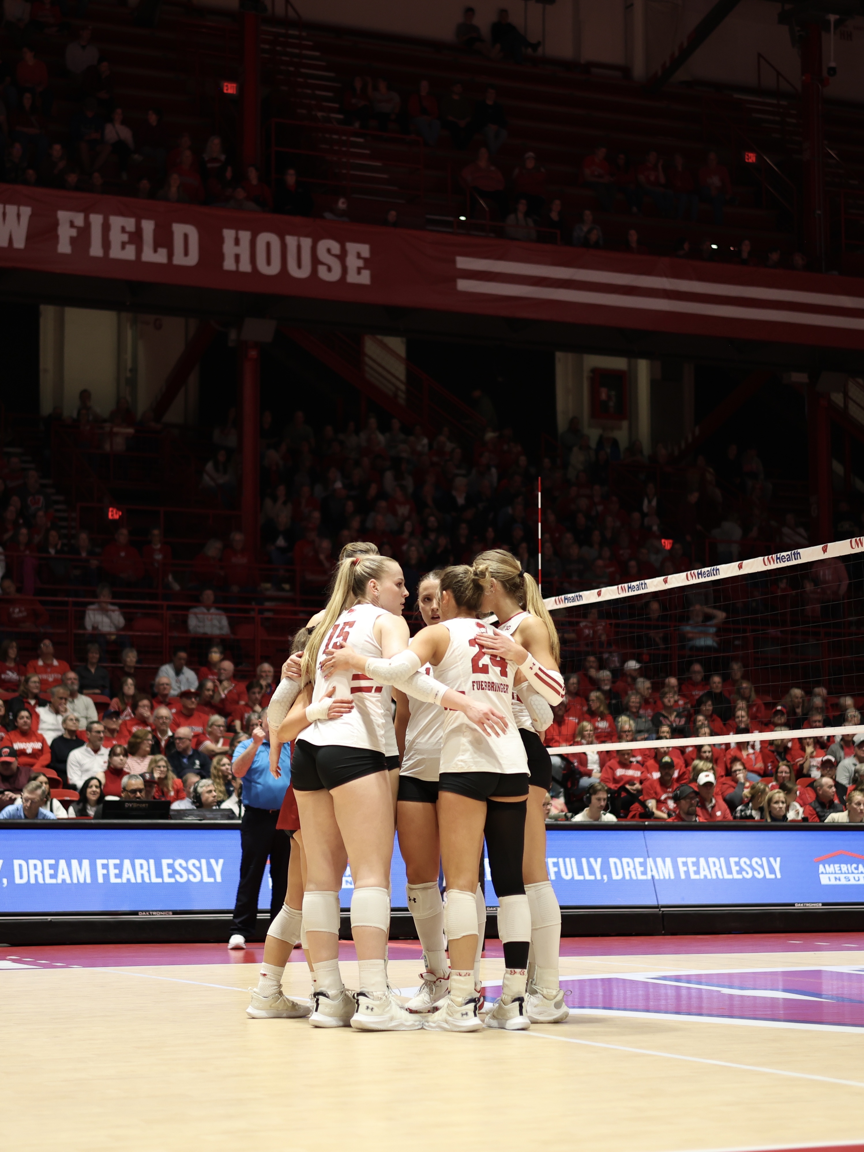 Wisconsin huddle after scoring a point against Marquette. (4.16.25)